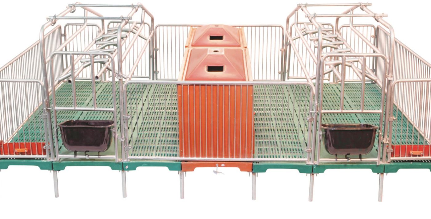 Farrowing crates with composite slatted floor